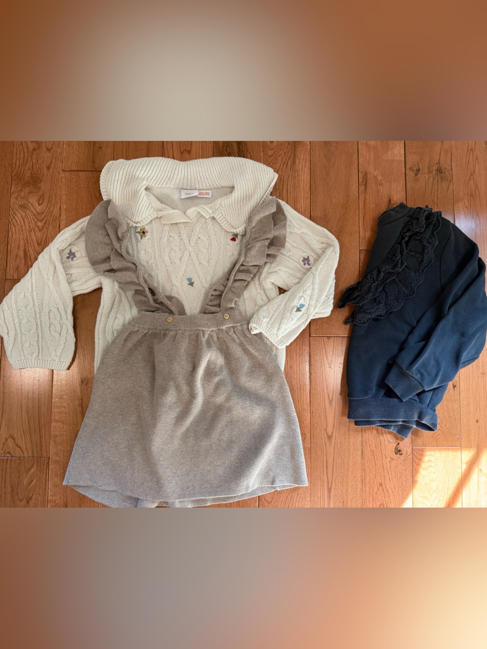 Cream Cable Knit Sweater, Beige Ruffle Suspender Skirt, dark gray sweatshirt